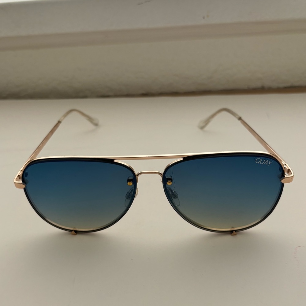 Quay “High Key Rimless” - blue lenses